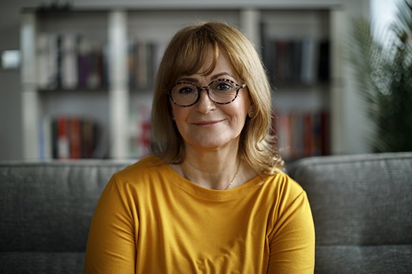 Portrait of smiling senior woman at home