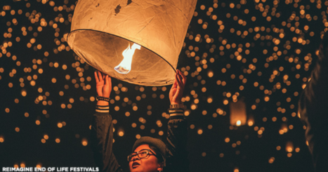 Young Asian person looses a floating lantern