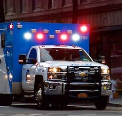 Ambulance with flashing red lights