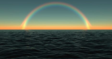 Rainbow over ocean