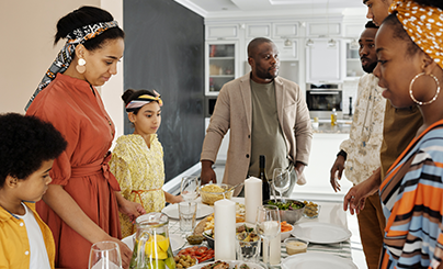 Family gathered together around a holiday table